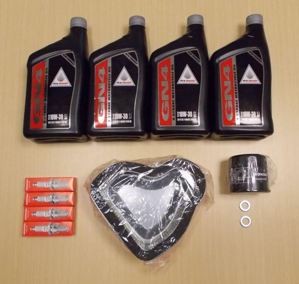 Honda Automotive Parts and Accessories Honda Complete Oil Service Tune-Up Kit 10w/30 - 4 Quarts with Spark Plugs Hon-401 Jorgensen Powersports